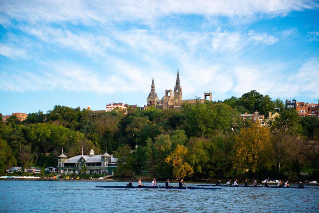 Georgetown University seen from a distance with the Potomac River in the foreground